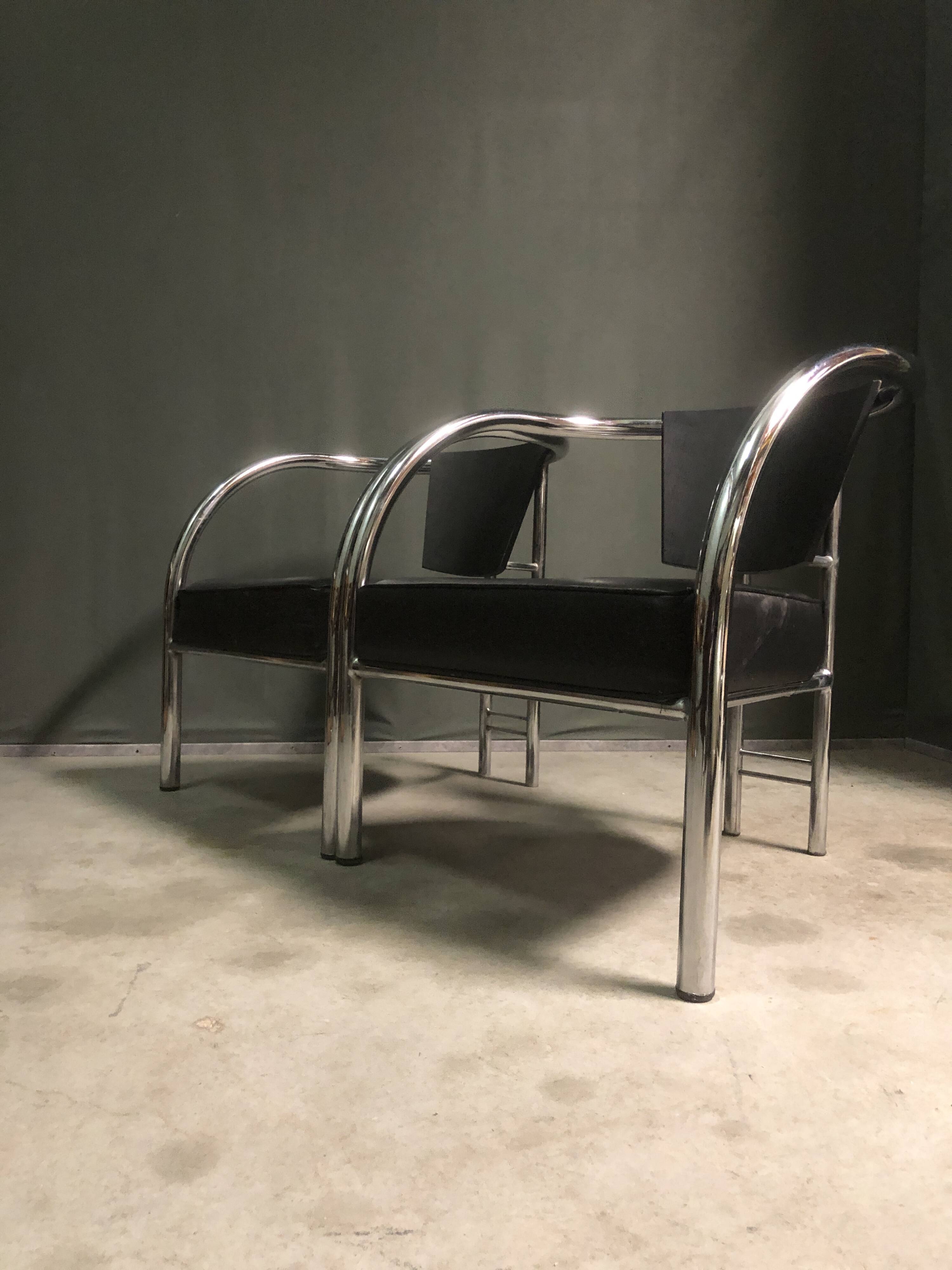 A pair of petite low armchairs by ronald cecil sportes for lumen center, 1987