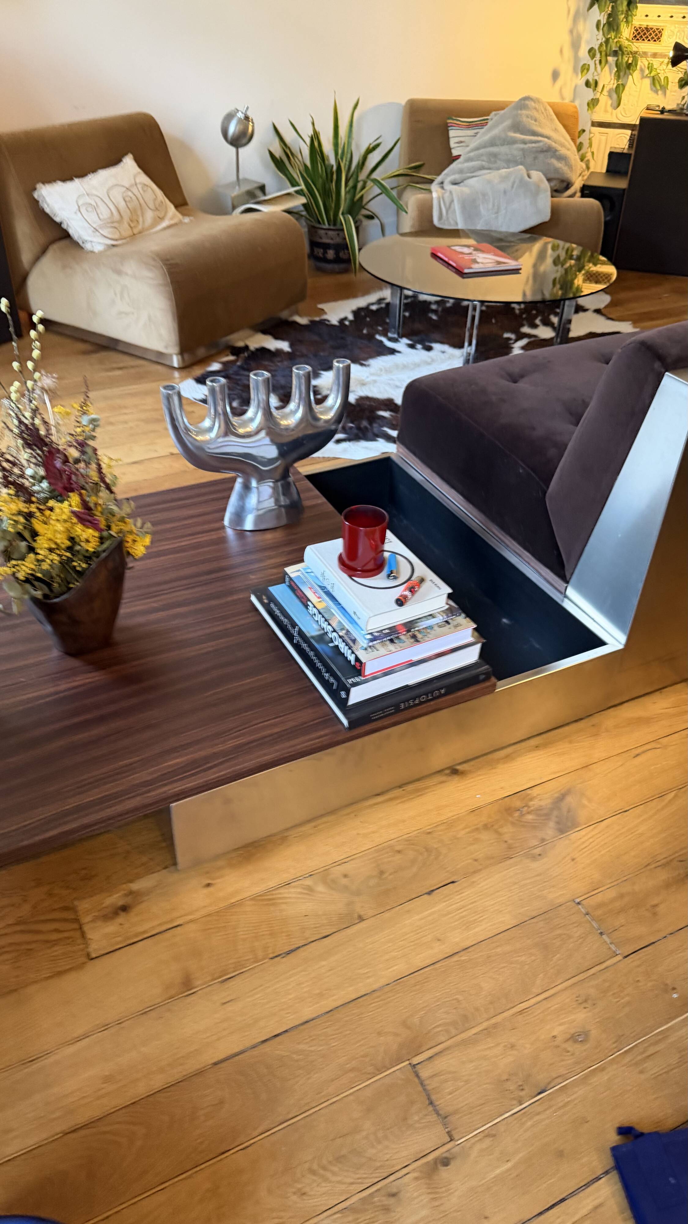 Red Edition Stanley 3-seater sofa with matching chocolate velvet storage.