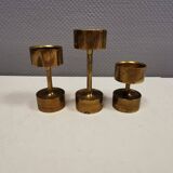 Three beautiful candle holders in solid brass, for block candles.