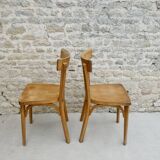Pair of Baumann bistro chairs in light wood