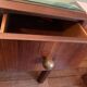 Rosewood desk, armchair and bookshelf.
