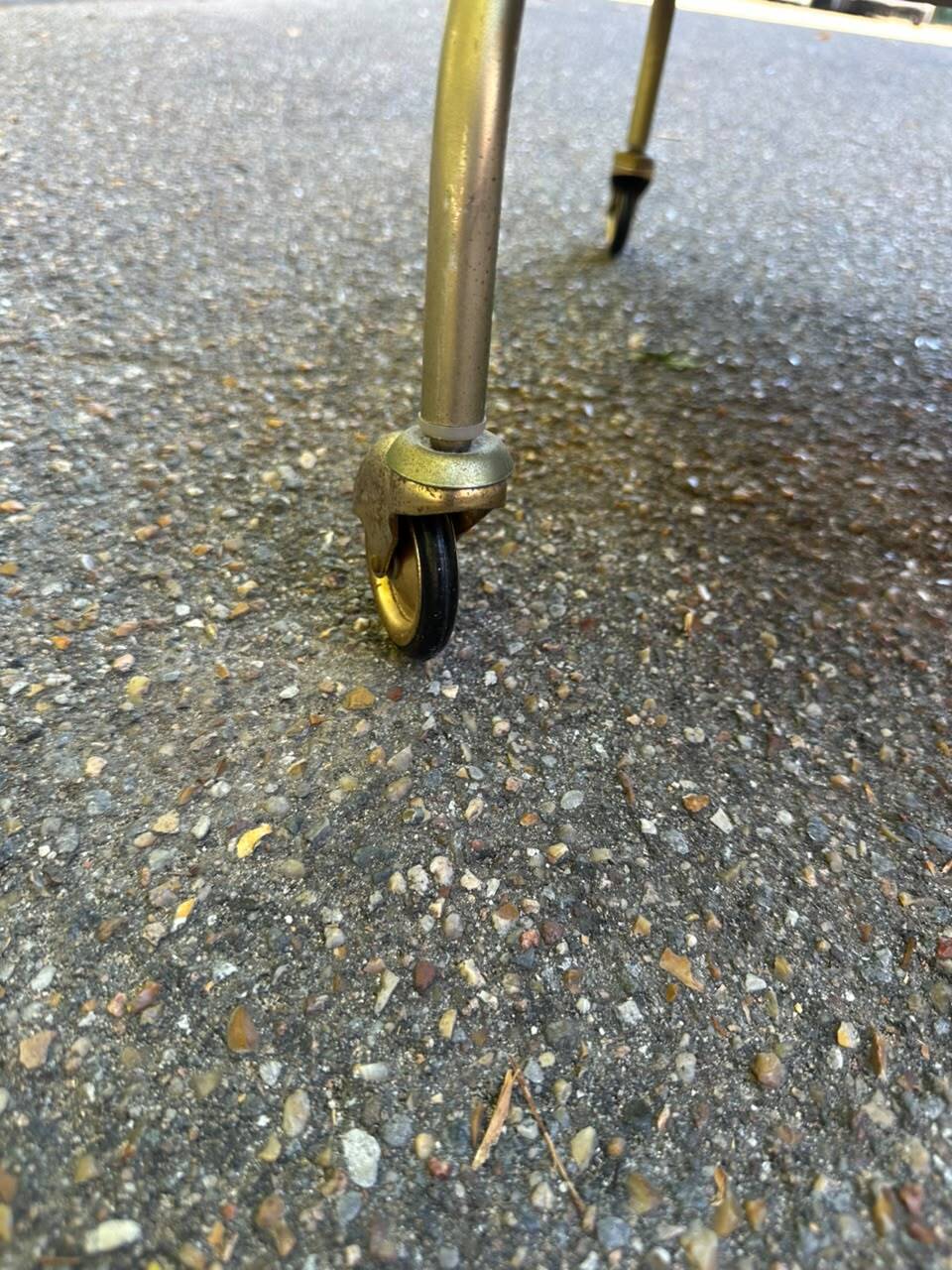Mid-Century 1978 brass and black smoked glass wheeled dessert trolley.