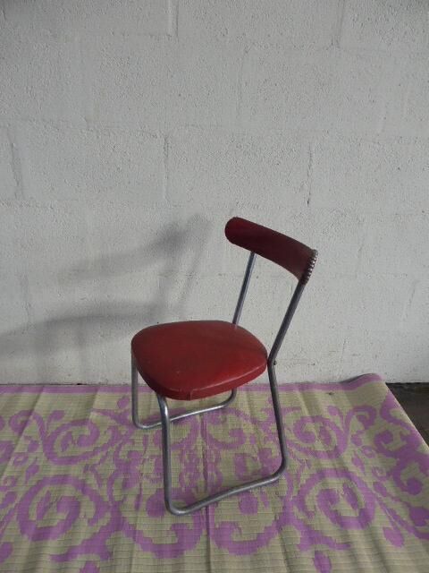 Chair in red leatherette and chrome metal vintage 1950