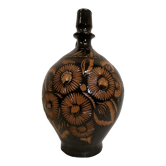 Jug in varnished sandstone