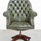 Chesterfield office chair in green cowhide leather on casters with high back