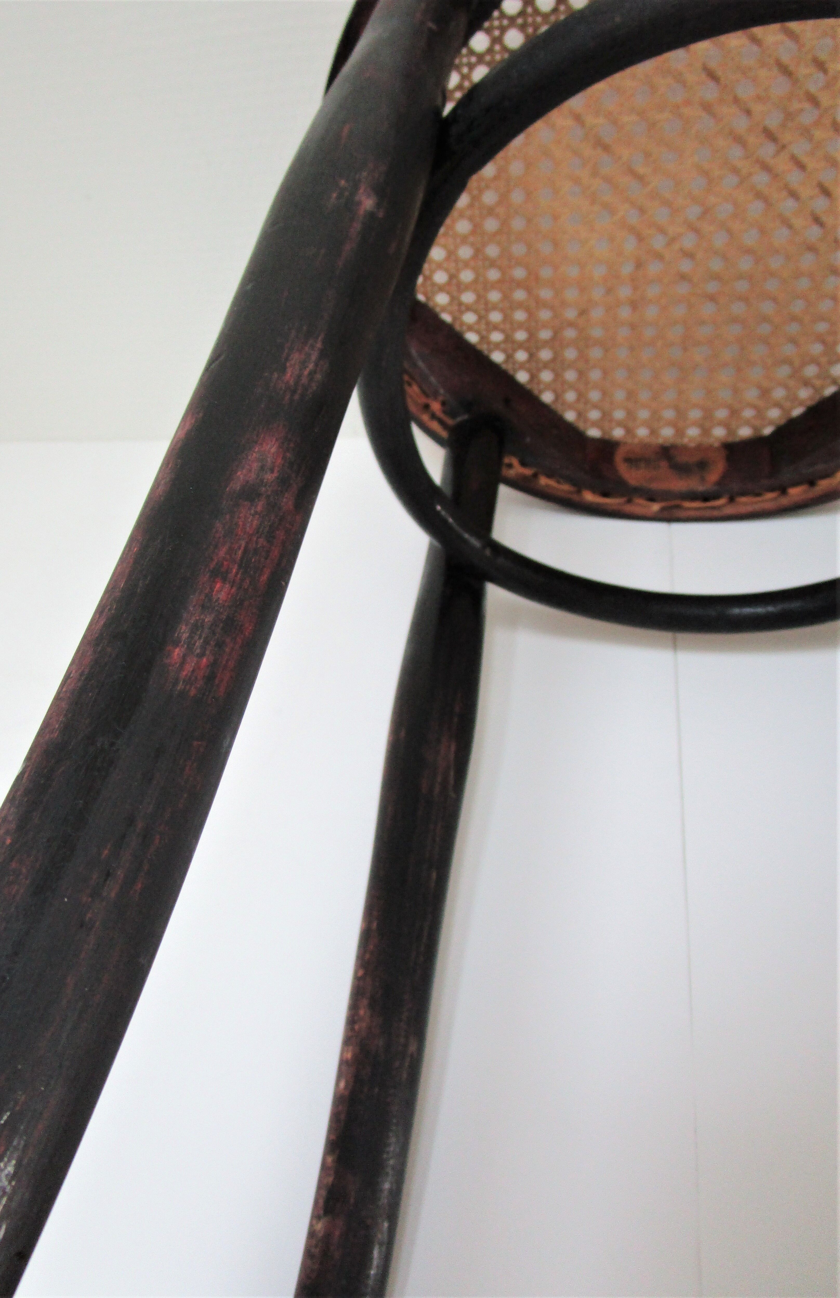Black skated Thonet stool stamped