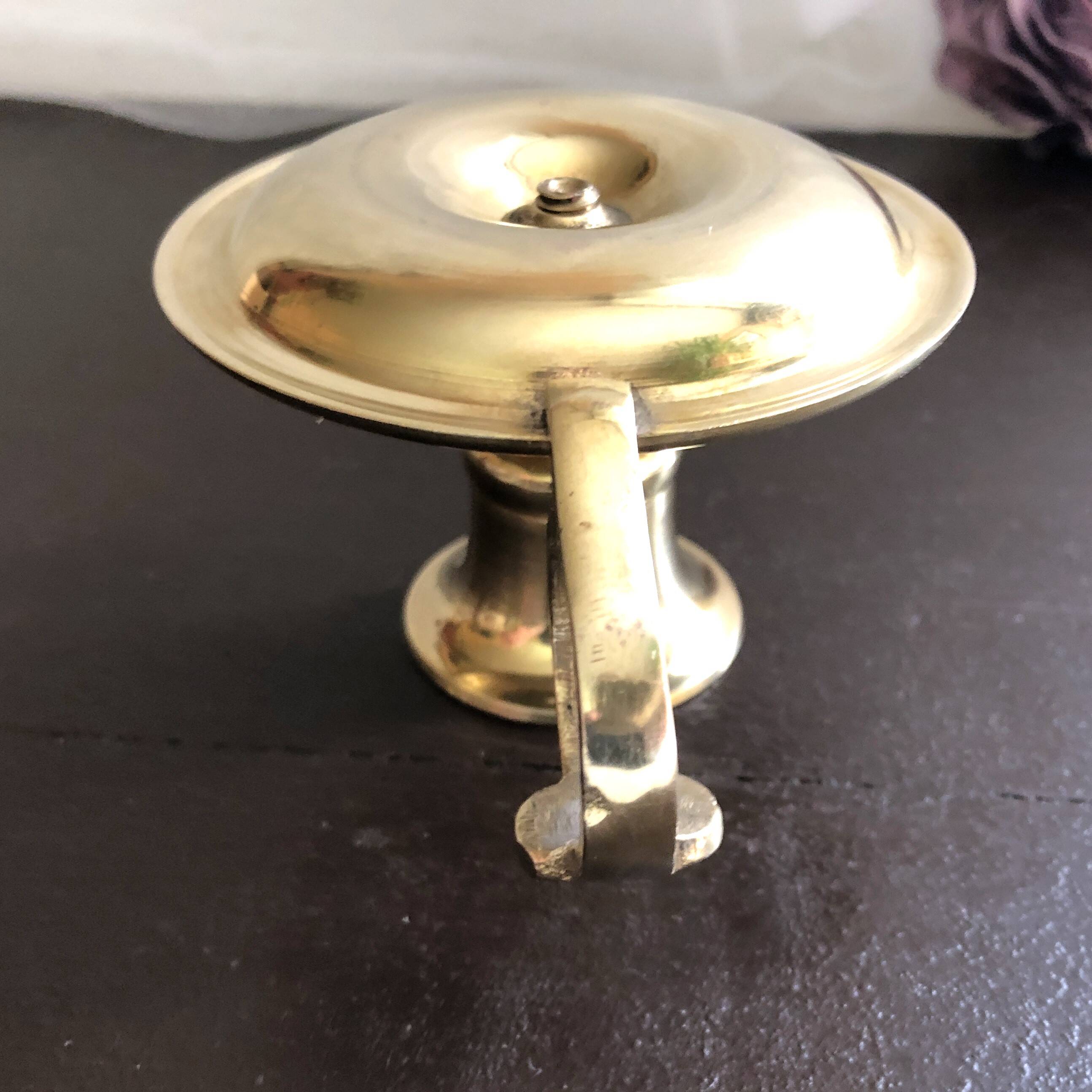 Hand candle holder called "Cave Rat" vintage golden brass