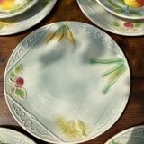 Service 10 plates and 14 sub-plates St Clement