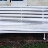 Cast iron and wooden slat garden bench from the early 20th century