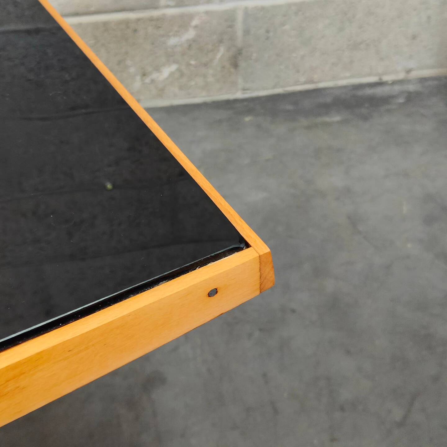 Metal and wood table, black Opaxit top, Czech Republic 1960