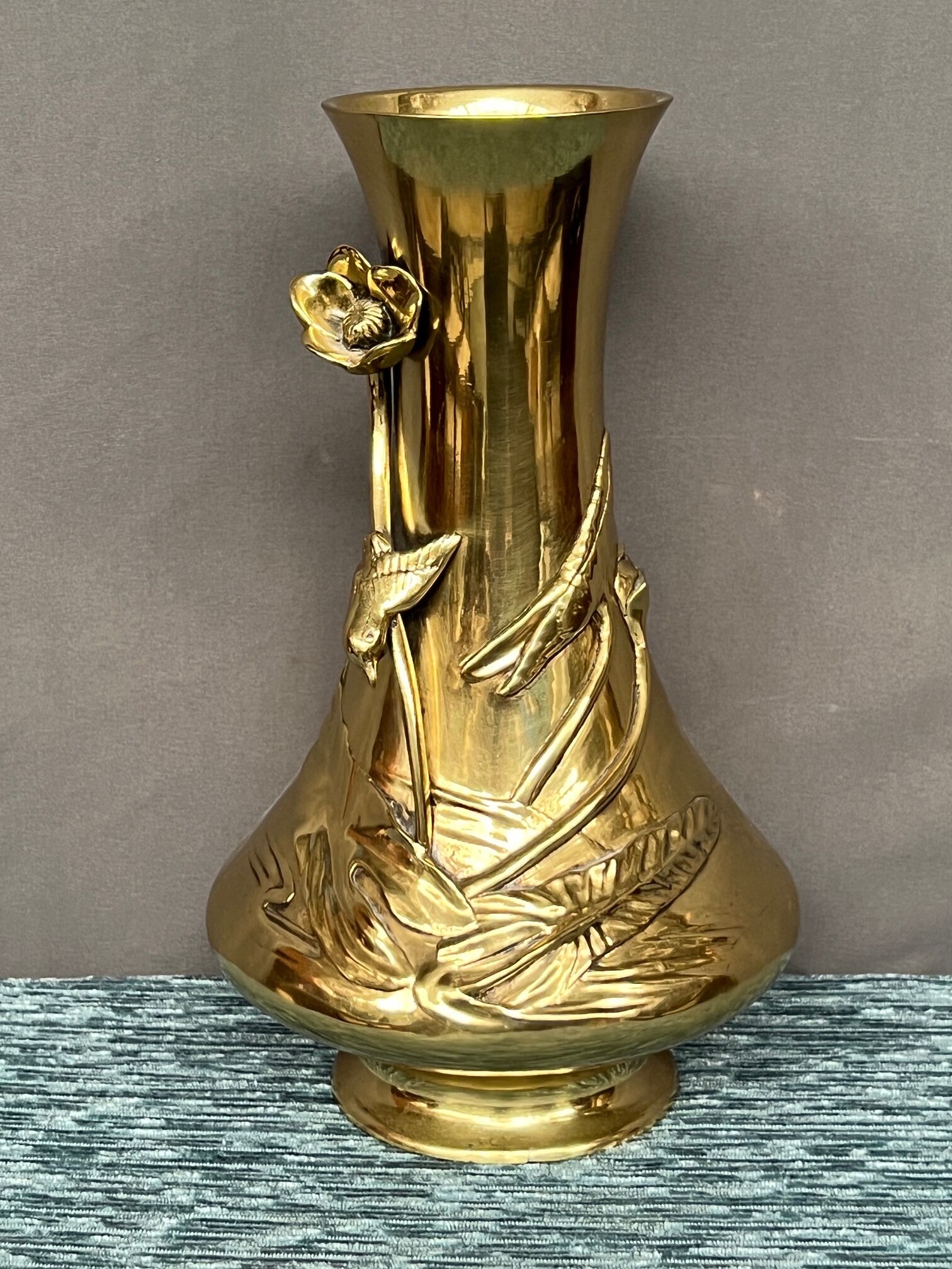 Massive bronze vase, decorated with bird figures and poppy flower.