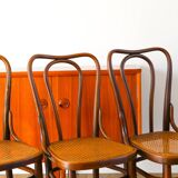 Set of 3 bistro chairs in wood and canework signed J. Kohn, Made in Austria, 20th century