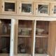 Old wooden grocery store cabinet, display cases and drawers