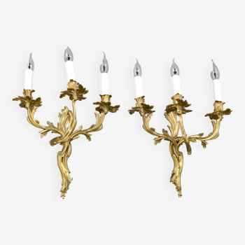 Pair of three-light wall sconces in gilded bronze, Louis XV style