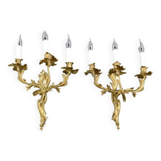 Pair of three-light wall sconces in gilded bronze, Louis XV style