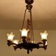 Large Art Deco sculptural chandelier in bronze and glass, 1930s