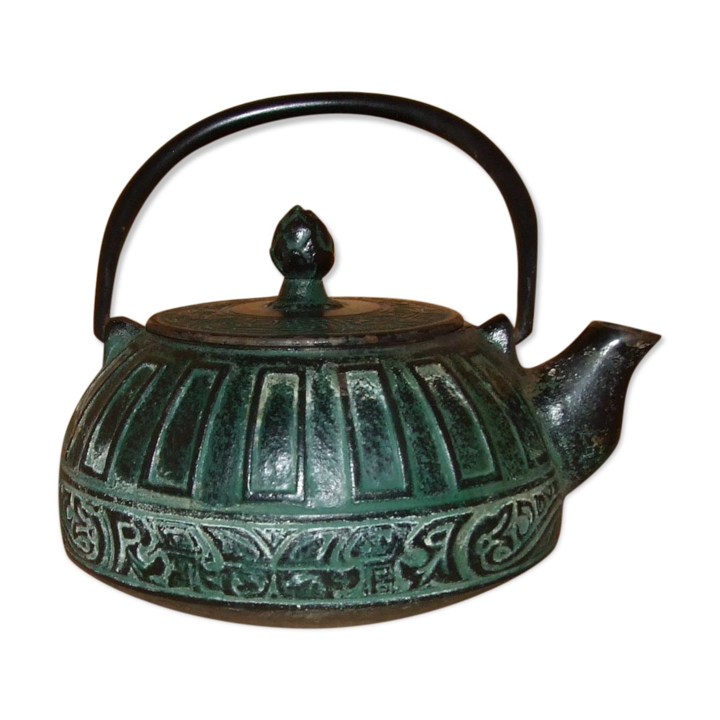 Japanese teapot in patinated green cast decorated with motifs