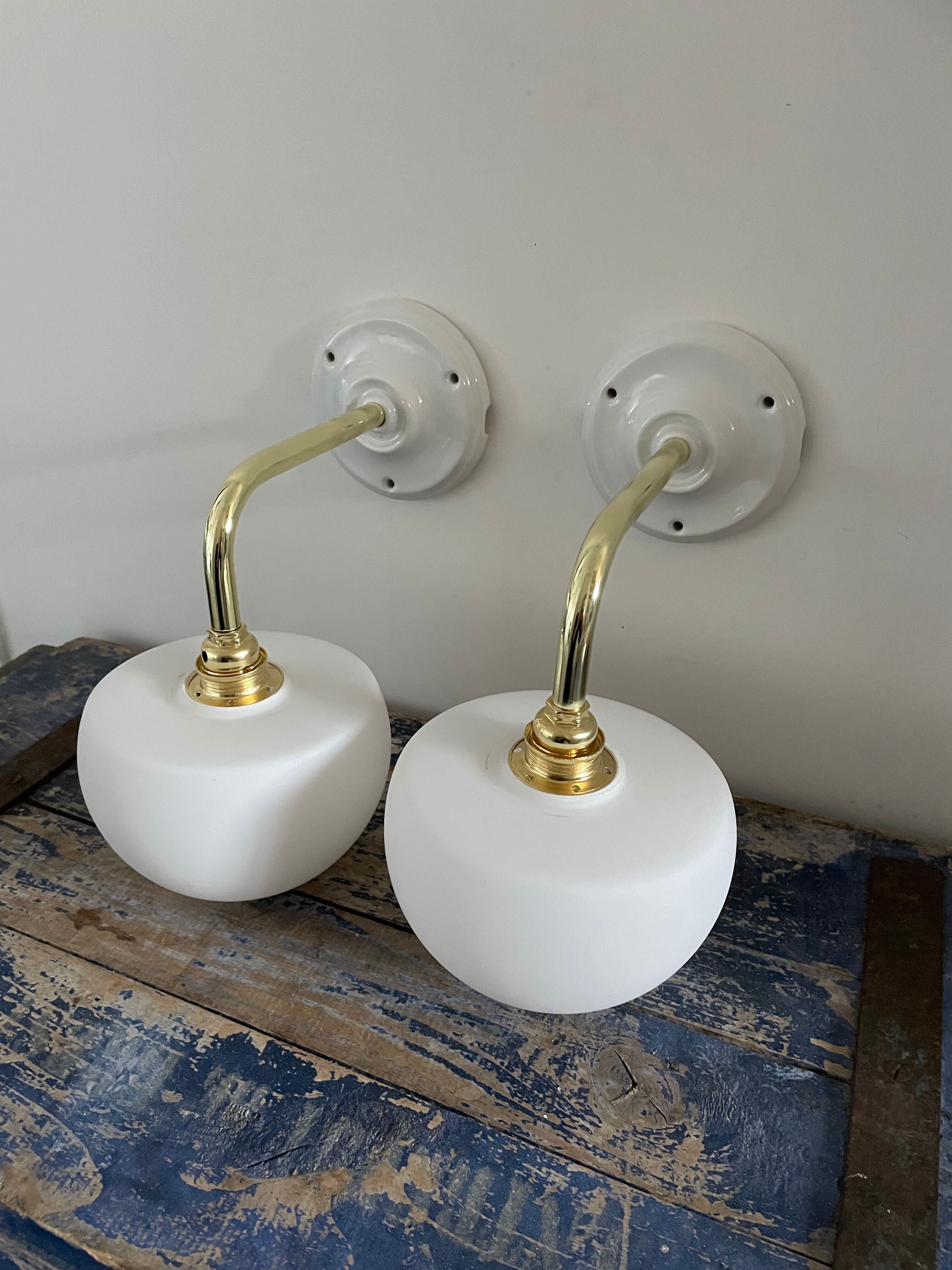 Set of two electrified white opaline wall lamps to nine