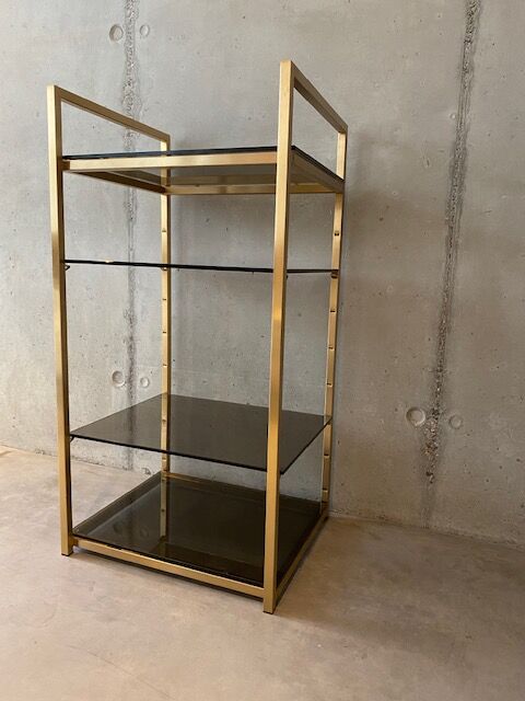 Golden brass and glass shelves