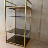 Golden brass and glass shelves