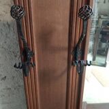 Oak and wrought iron coat rack from around 1900.