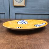 Oval dish decorated with hand-painted blue fish, Mediterranean style