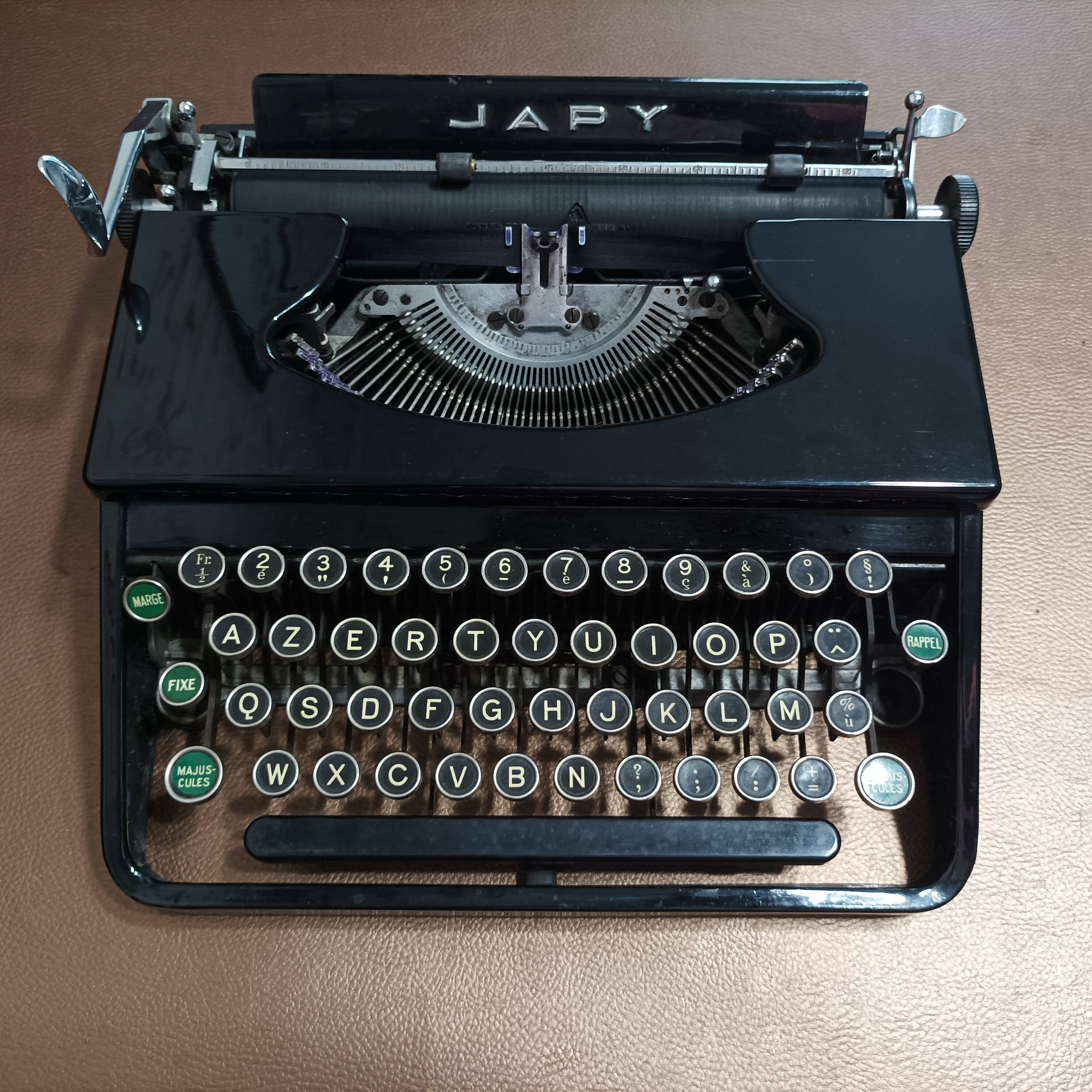 Japy portable typewriter, shiny black metal, 1950s