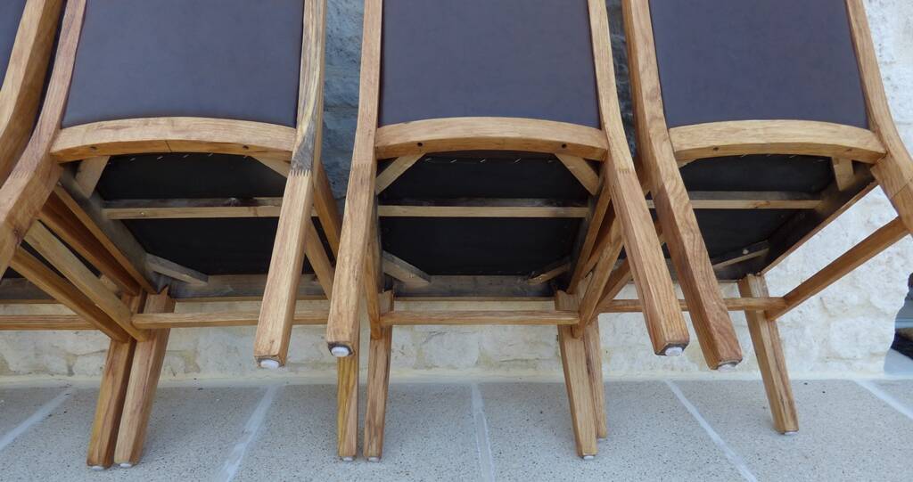 6 High-back chairs in high-quality, plush solid wood with brown faux leather
