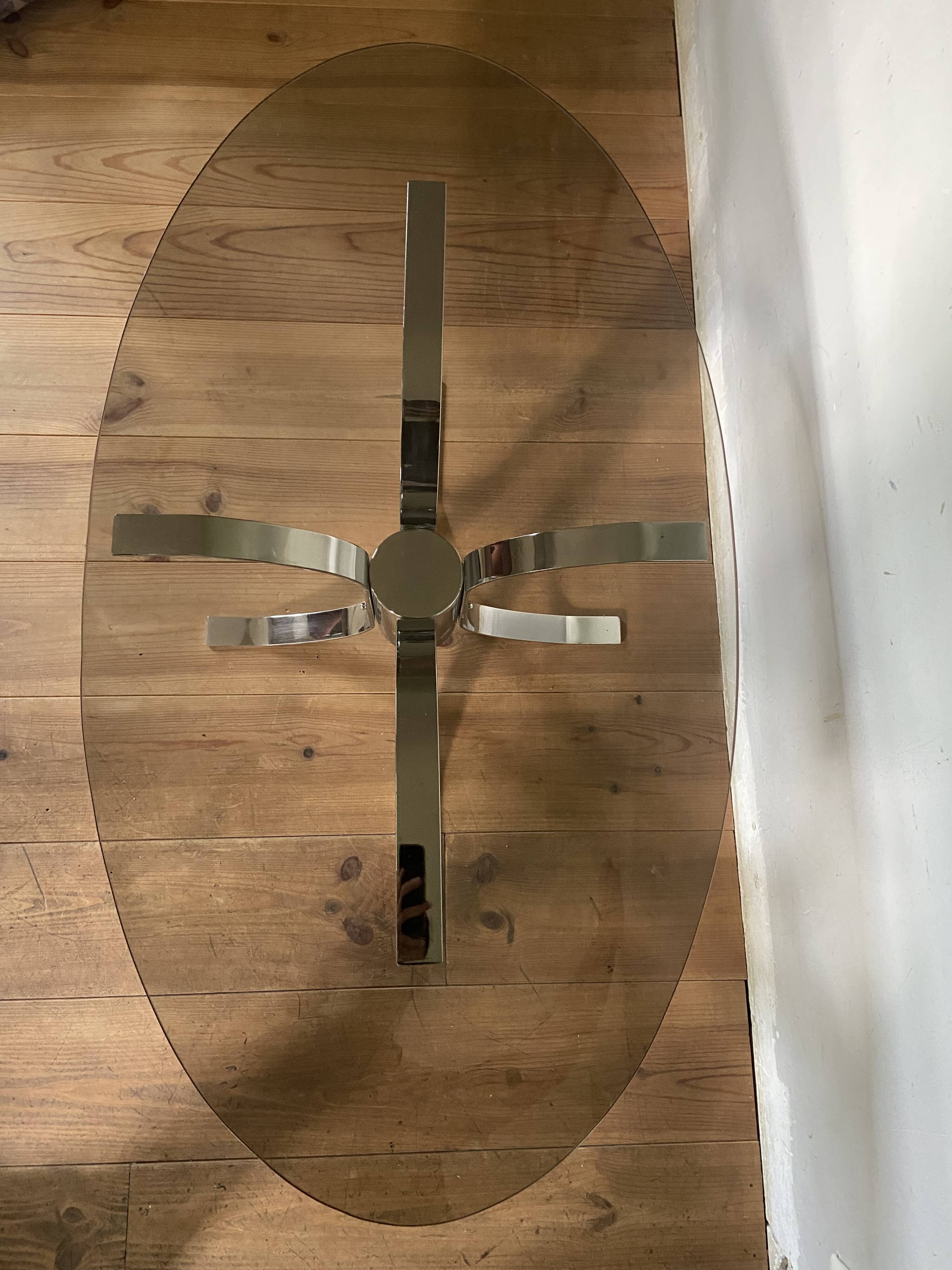 Modernist chrome and smoked glass table with tulip base from the 70s