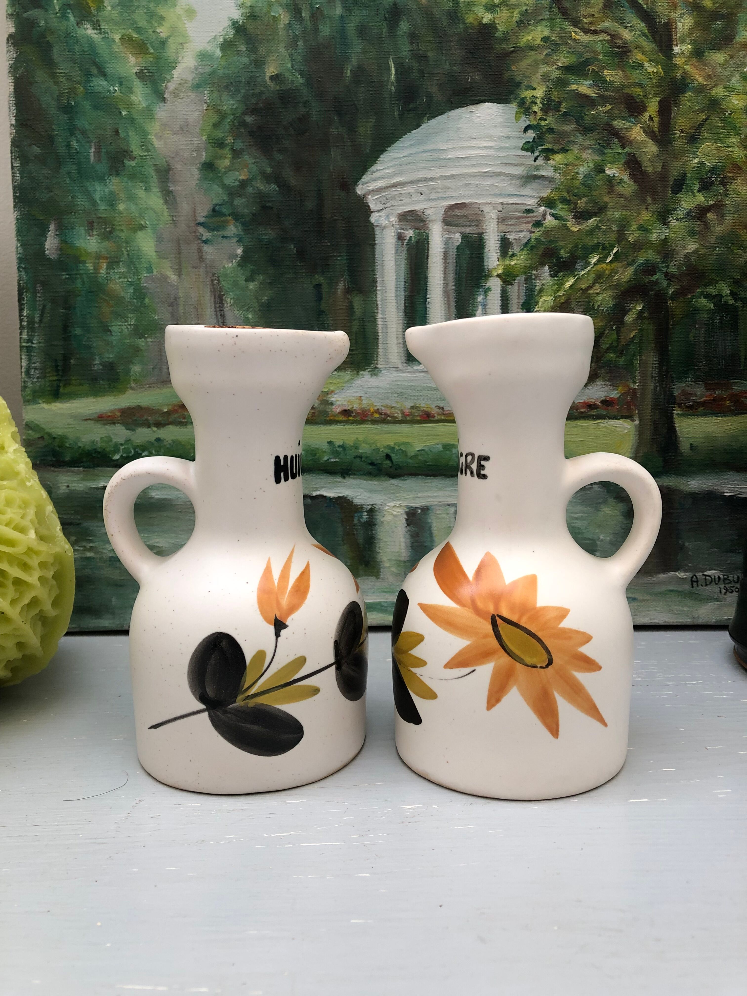 Old vinegar and oil maker with vintage decoration floral motifs