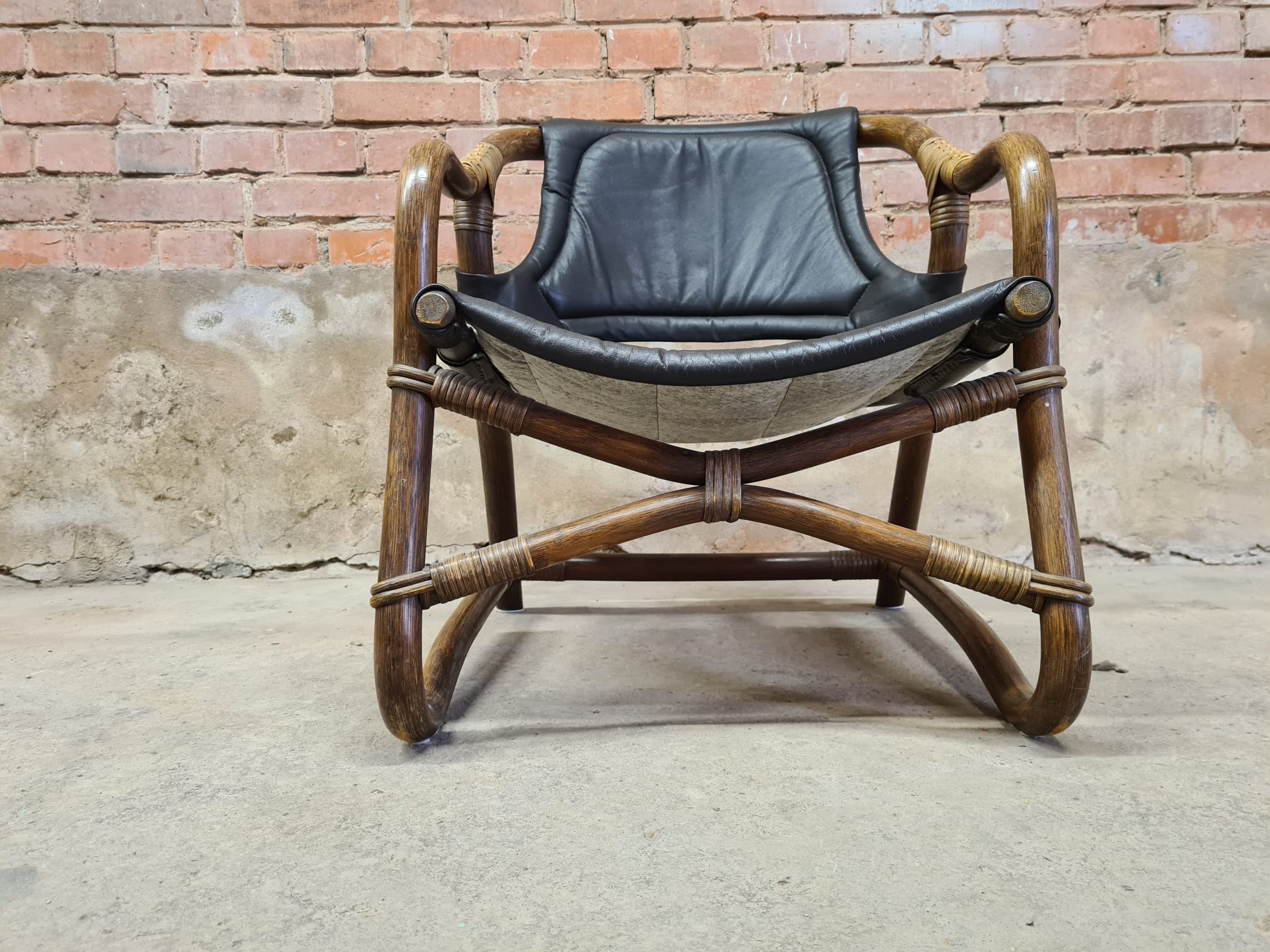 Pair of vintage skaï bamboo armchairs