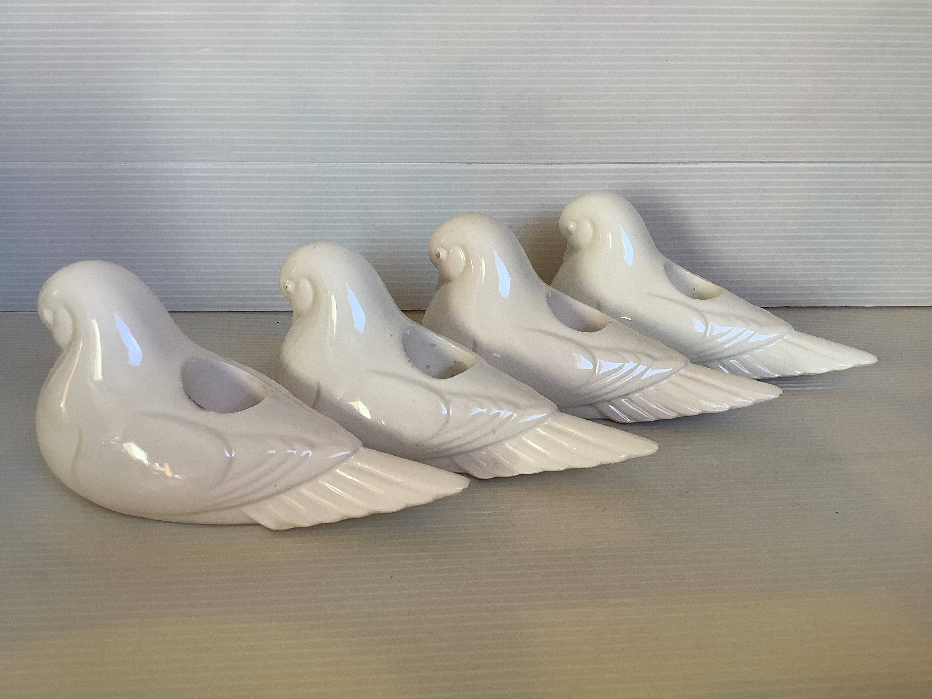 Seven dove bird candle holders