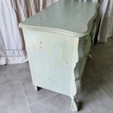 Curved patinated chest of drawers