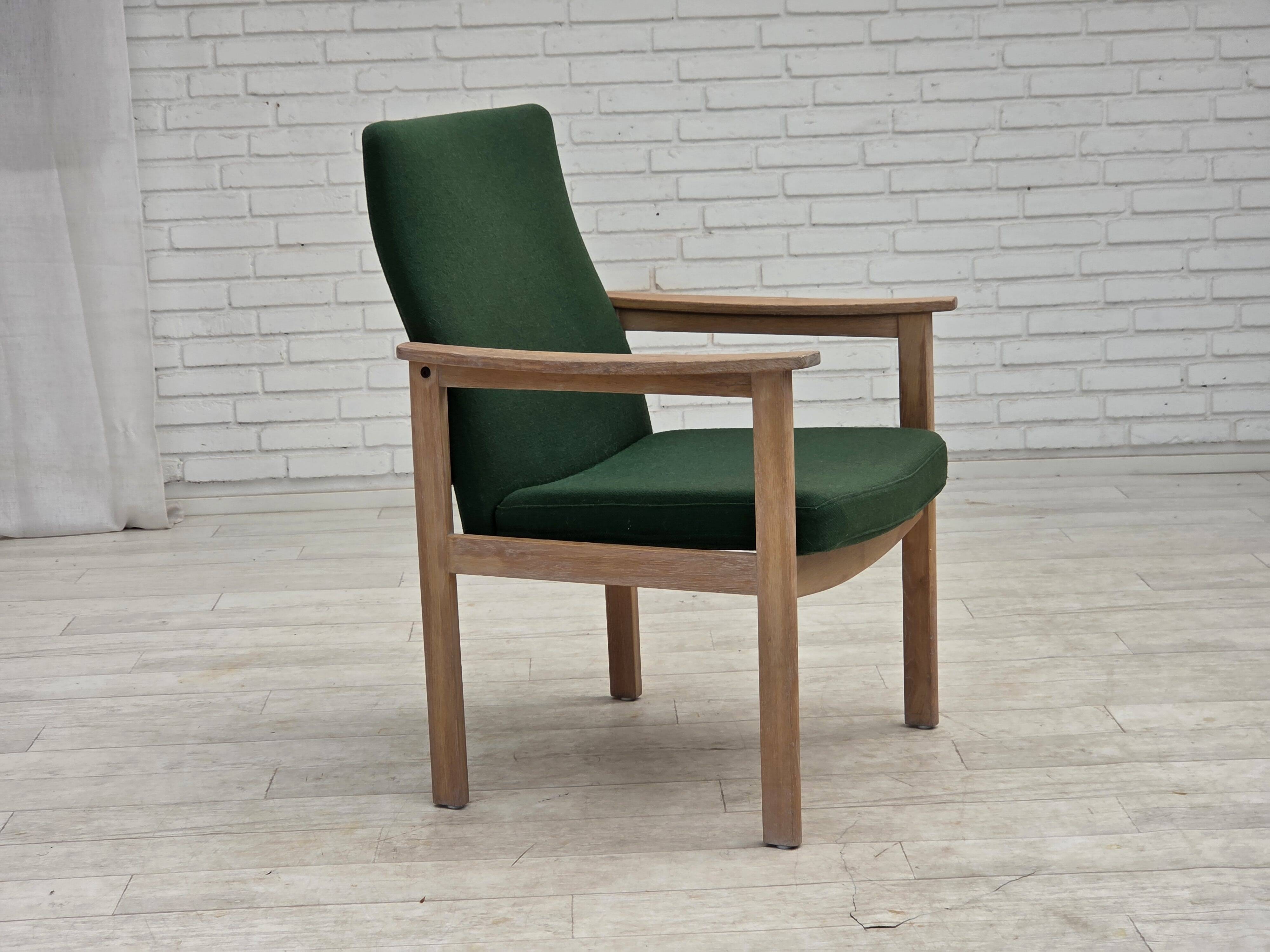 1980s, Danish armchair by Høng Stole, green furniture wool, oak wood.