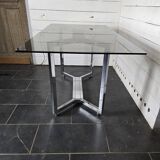 Chromed metal table with smoked glass top