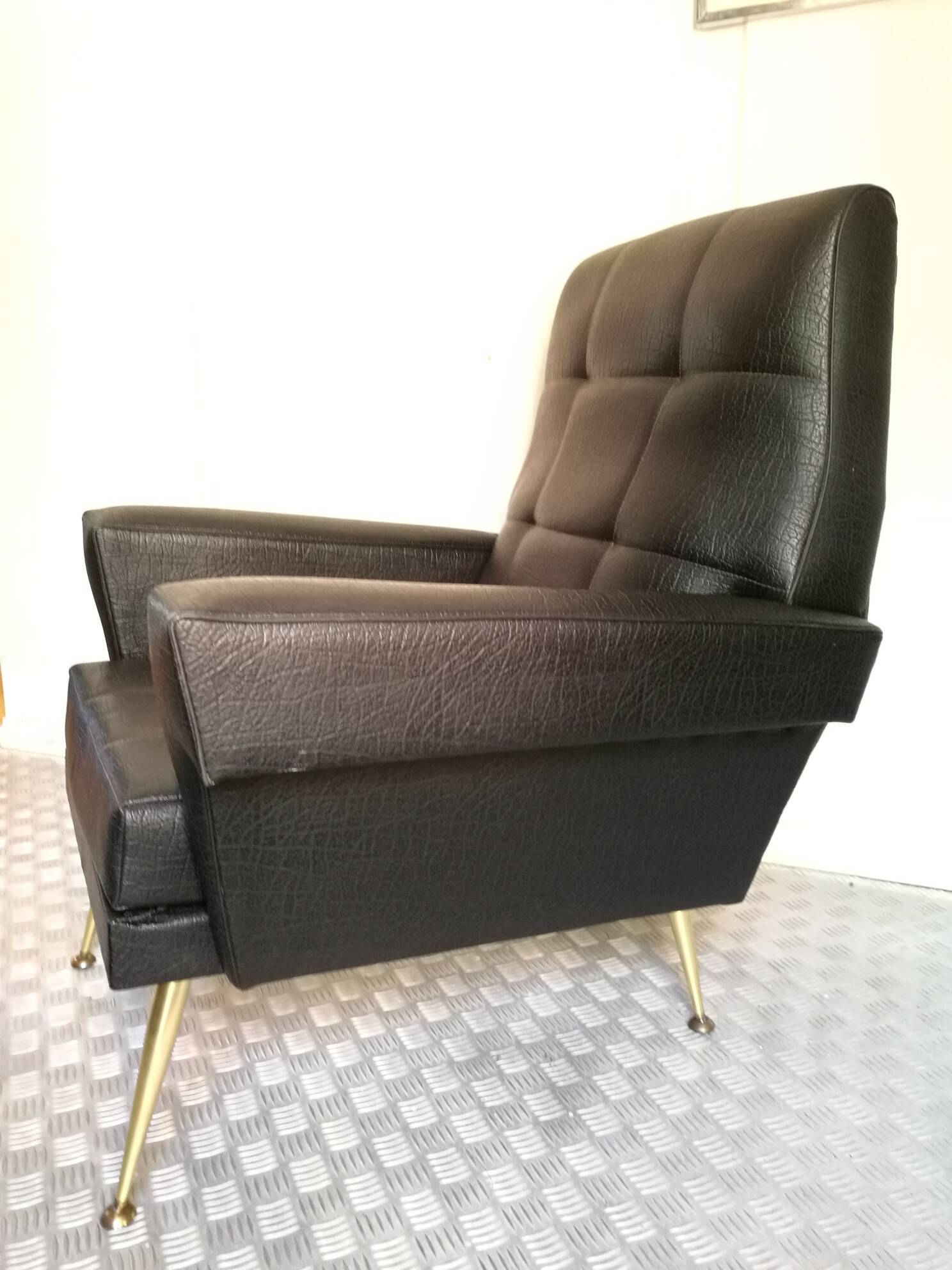 Pair of vintage leather armchairs