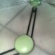 Coat rack with 4 green metal hooks from the 70s