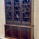 English two-piece mahogany bookcase, made in the 1970s