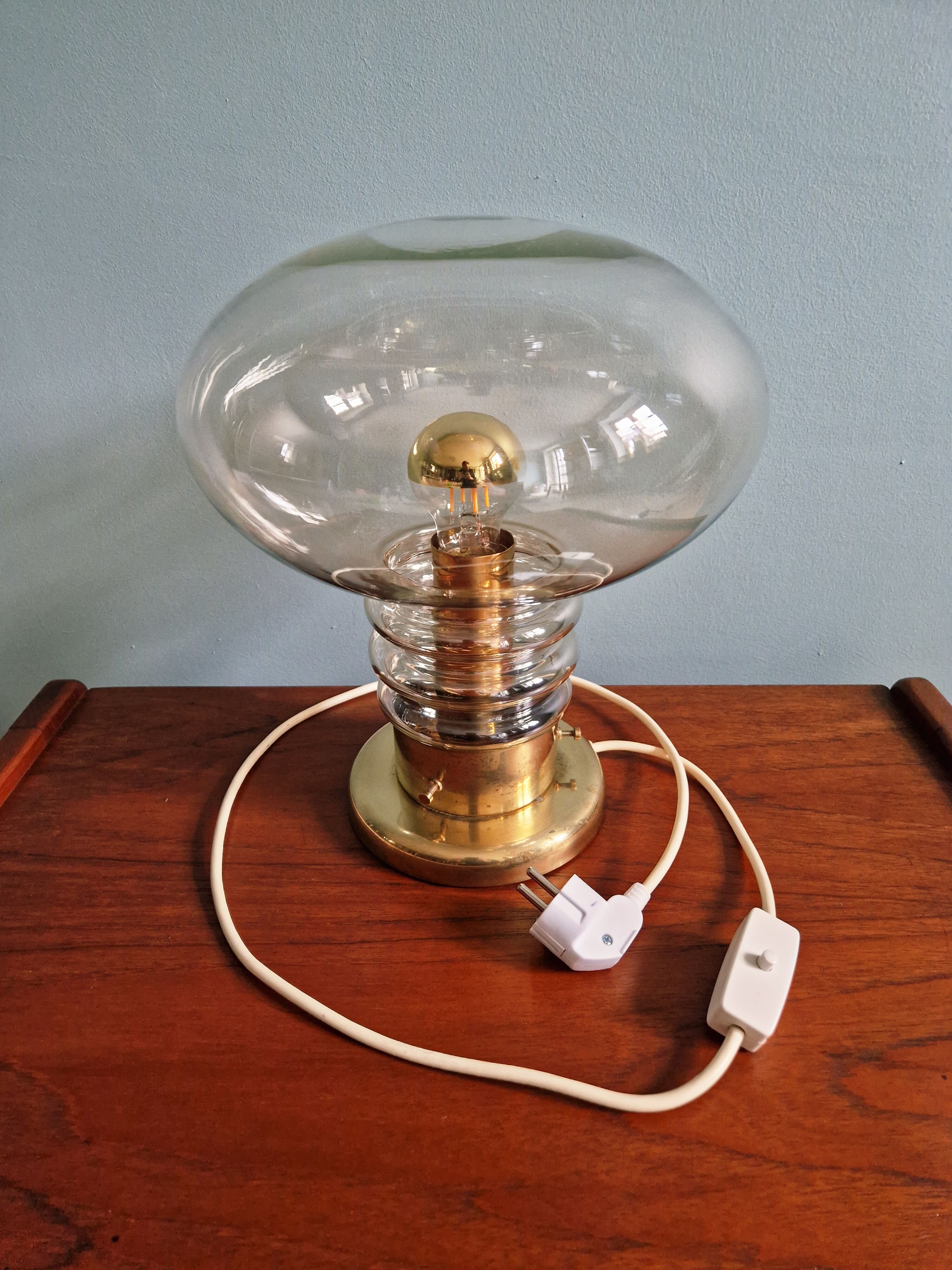 Space Age table lamp in brass and clear glass, 1960s-70s.