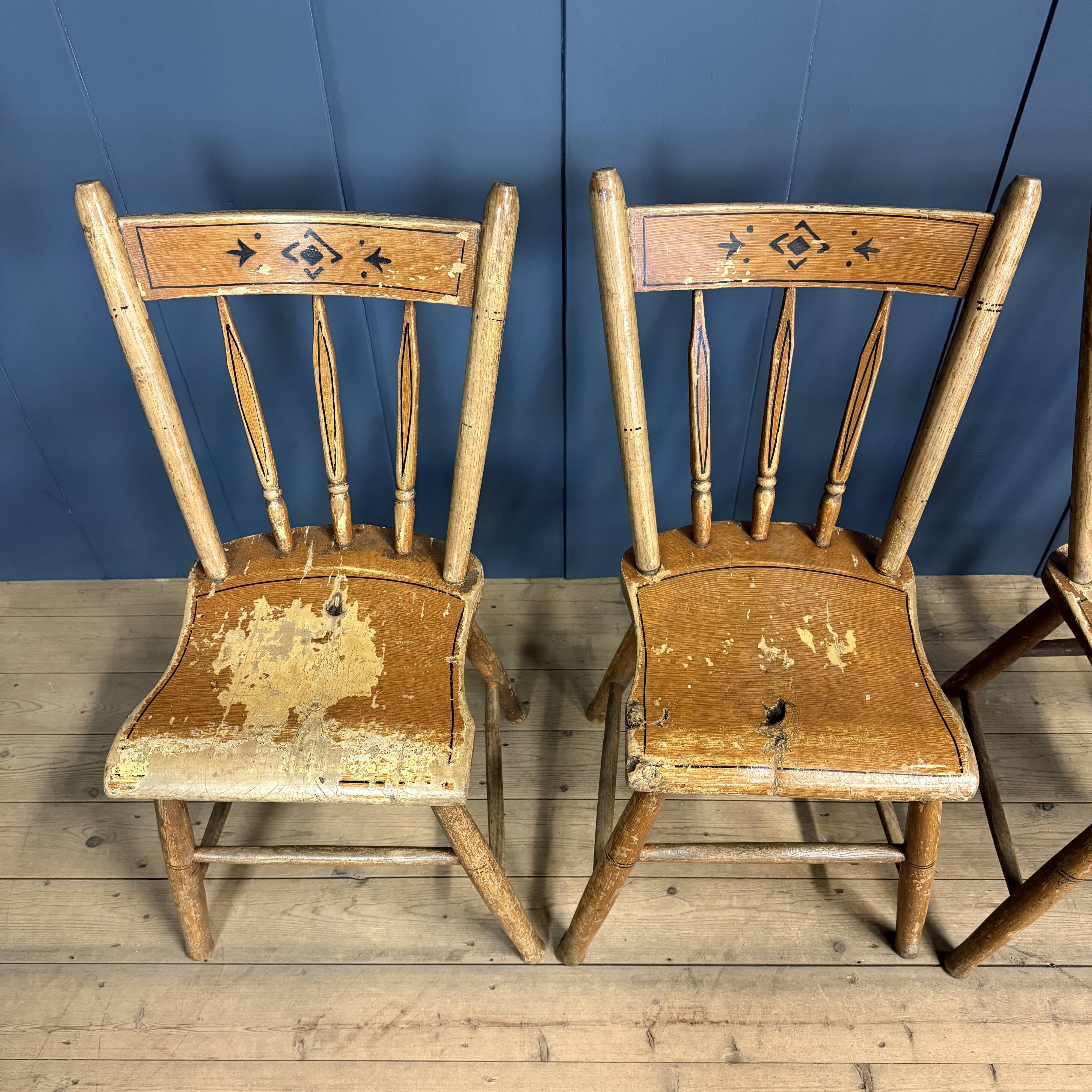Set of four painted Dutch kitchen chairs.