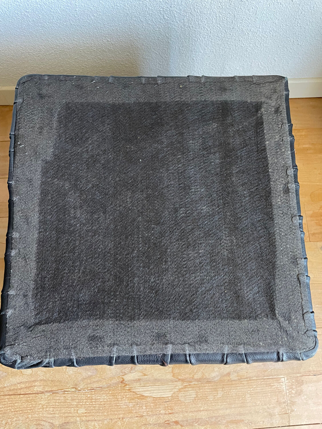 Black leather chest ottoman from Sède