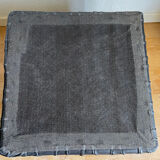 Pouf coffre en cuir noir de Sède