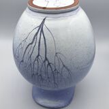 Blue glazed terracotta pitcher with hand-painted decoration, signed