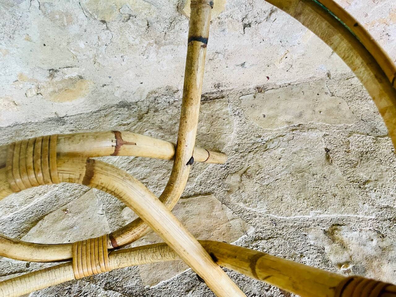 Round bamboo and rattan coffee table with glass top, circa 1960s