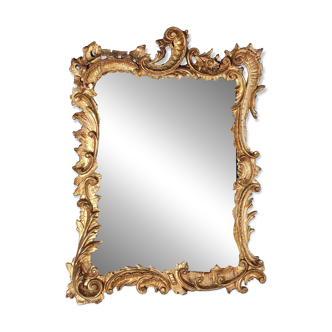 Miroir vers 1800 cadre en bois sculpté doré décor rocaille 54x39 cm C227