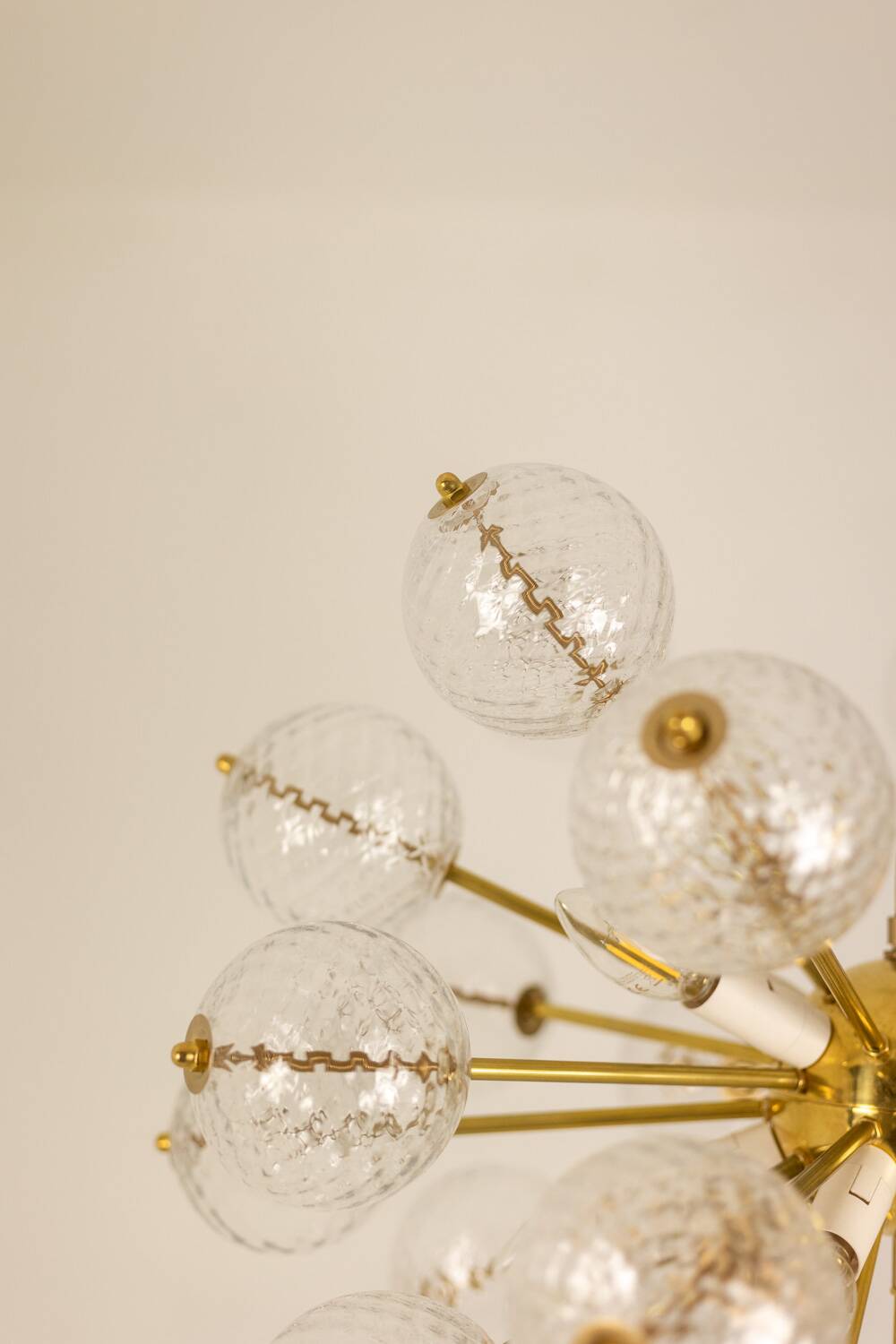 Kamenický Šenov, published by. Brass and glass chandelier. Around 1970.