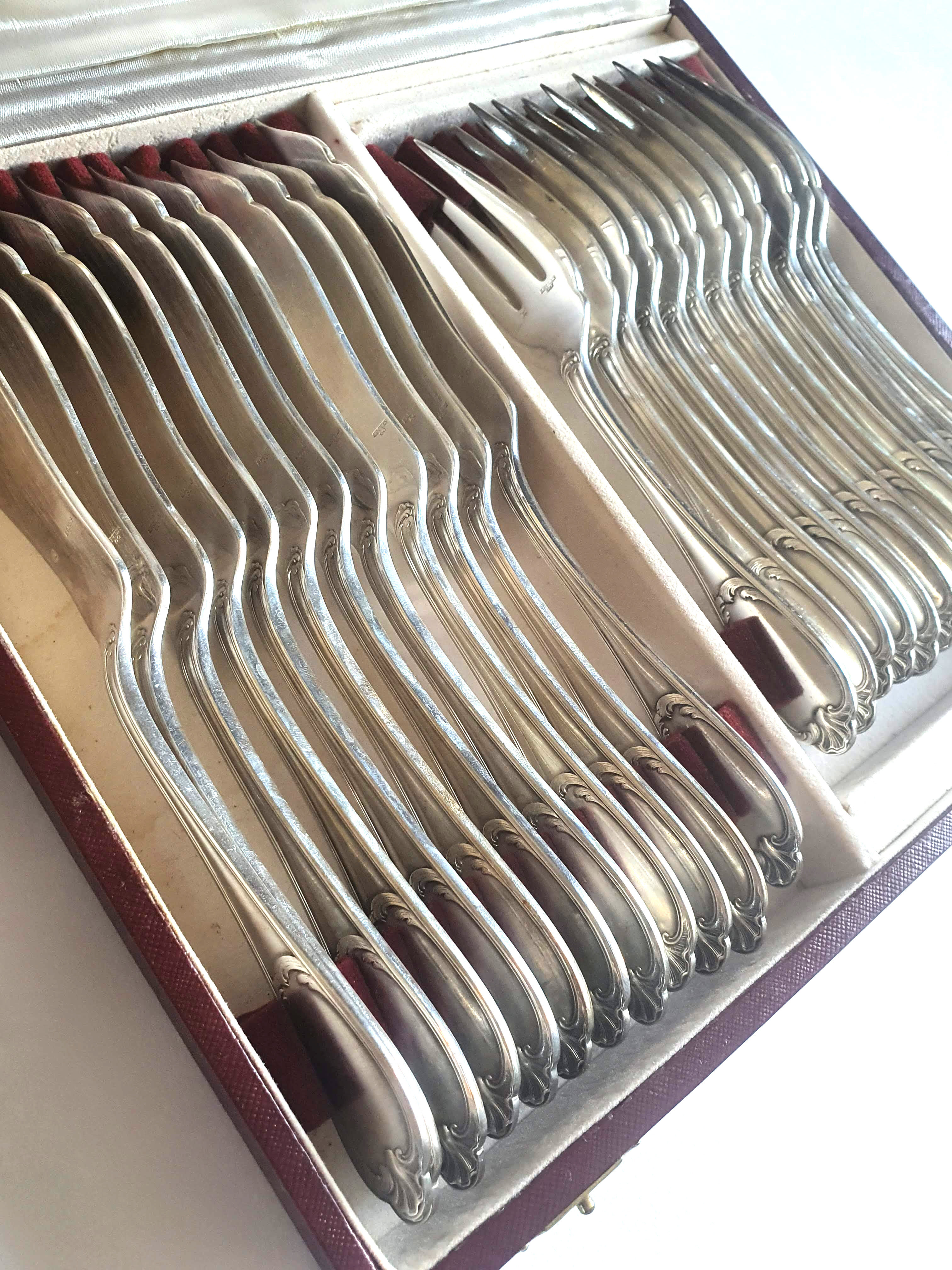 Fish set in silver metal Ercuis