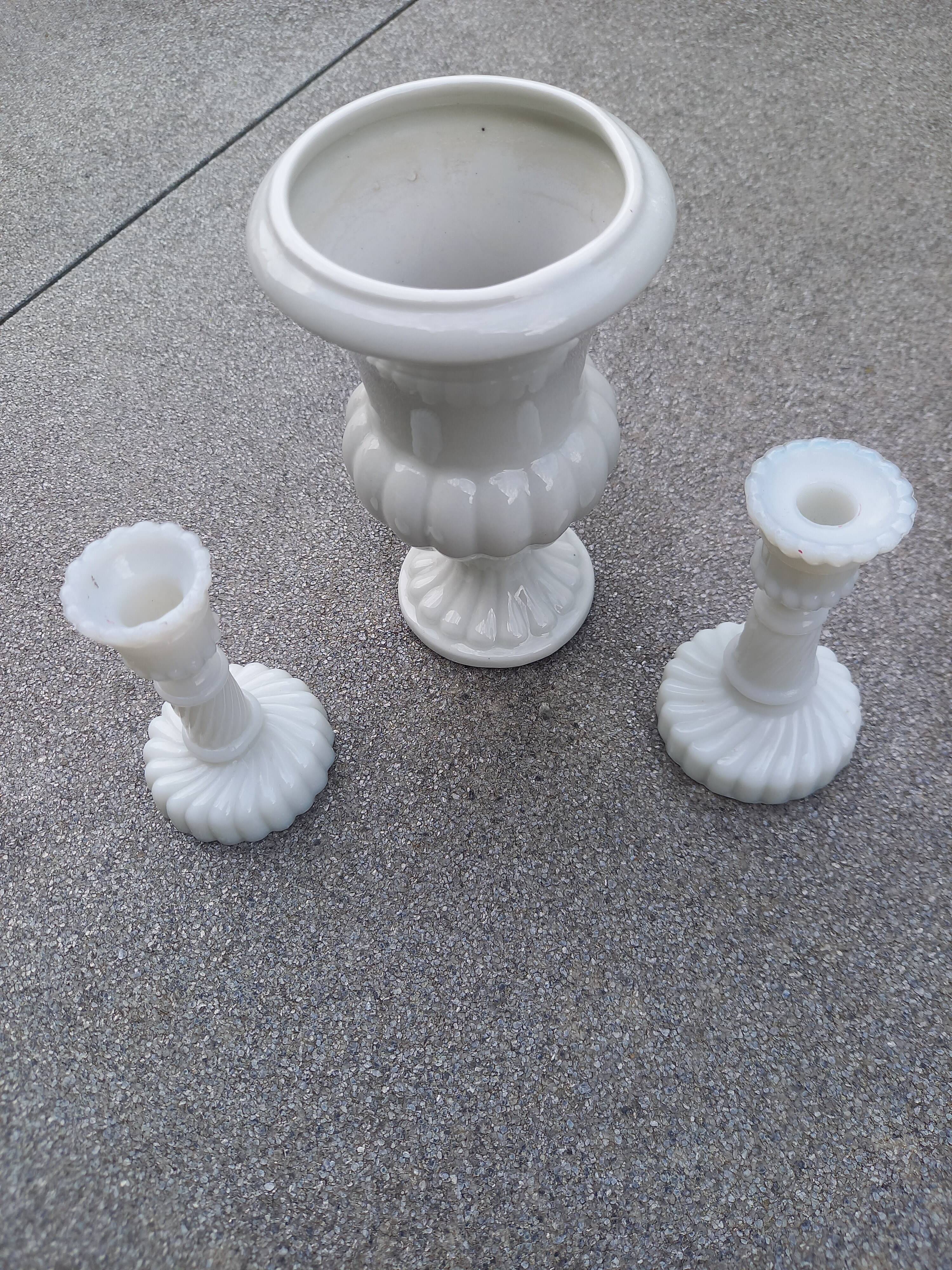 2 candle holders and earthenware vase
