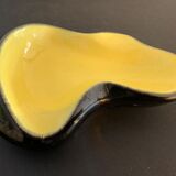 Yellow and black ceramic ashtray