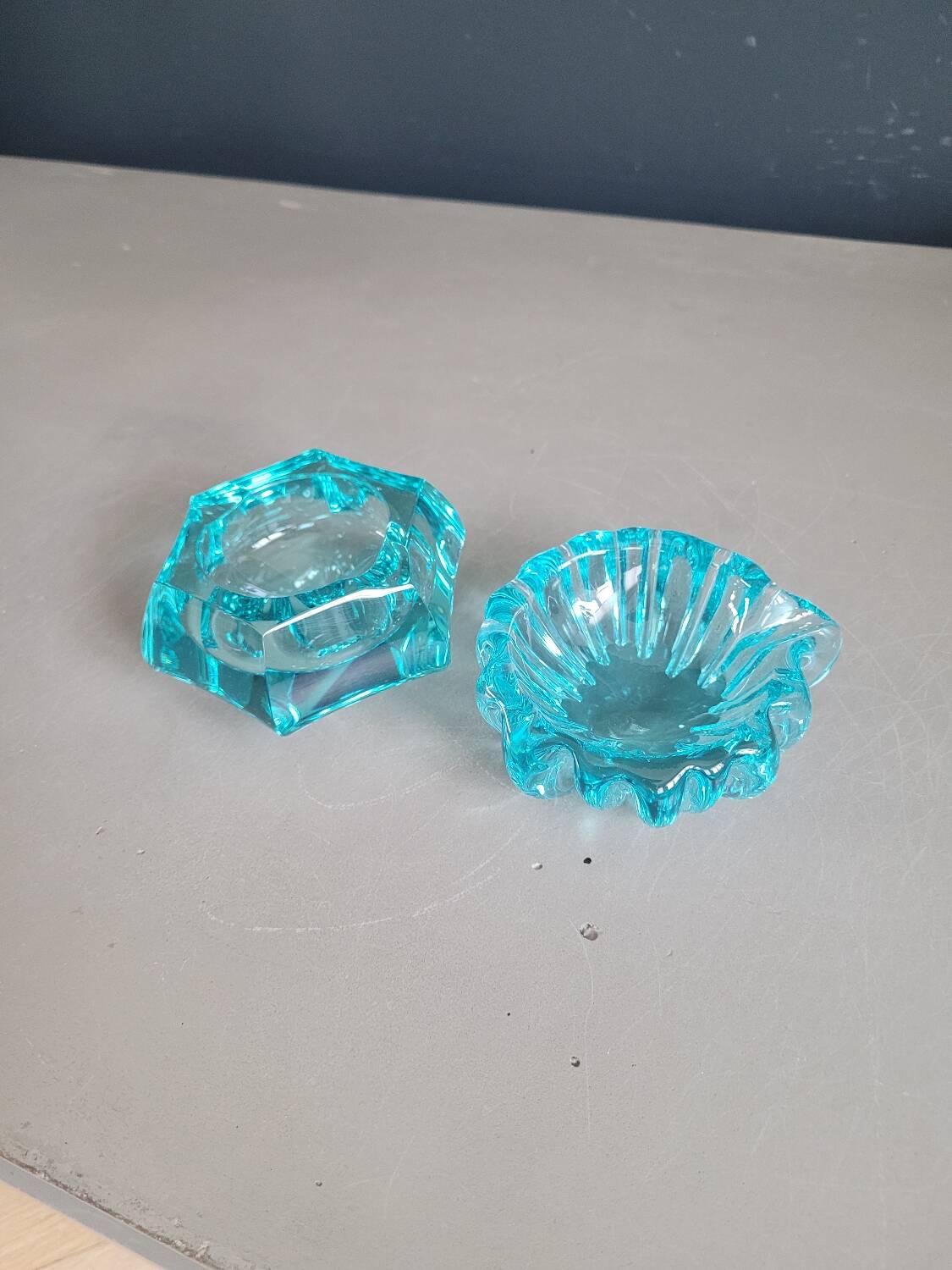 Set of 2 assorted turquoise glass ashtrays